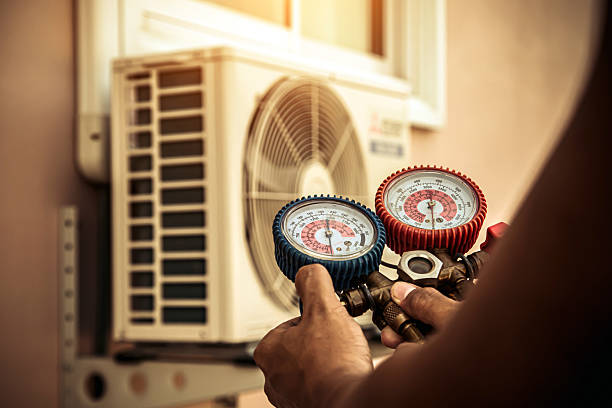 Professional Air Conditioning Service technician working in Addis, LA